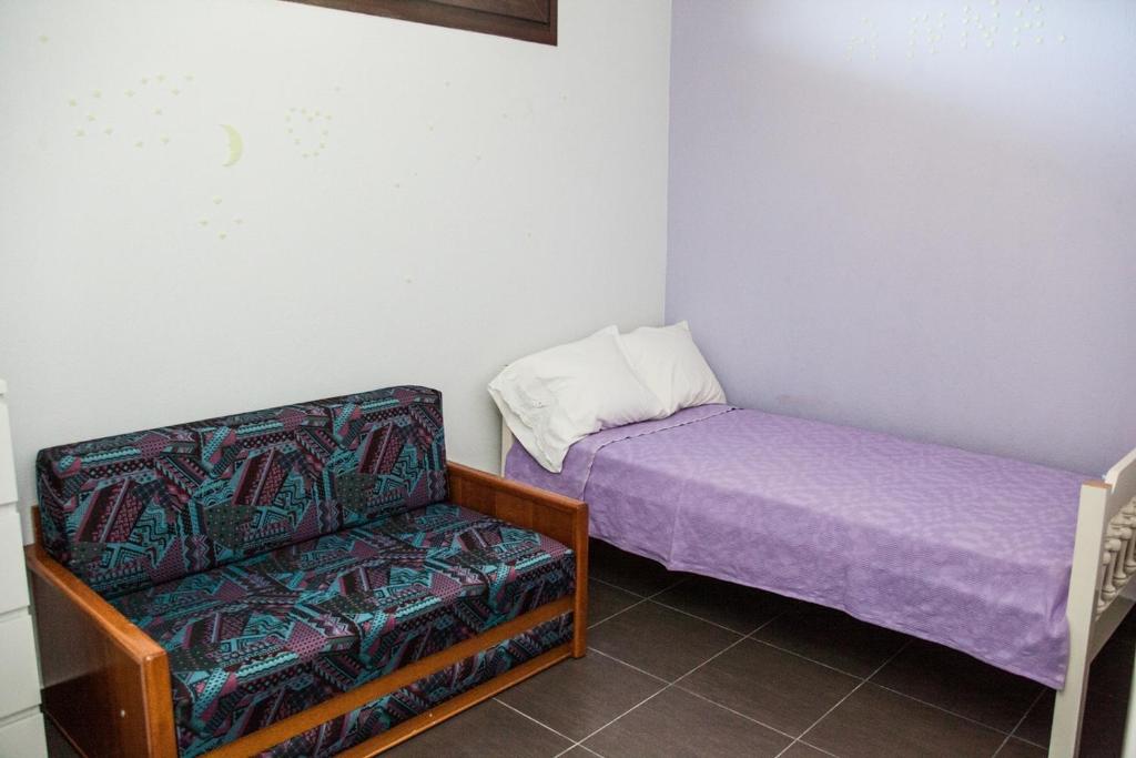 Postel nebo postele na pokoji v ubytování Sea view appartment in Geoponika