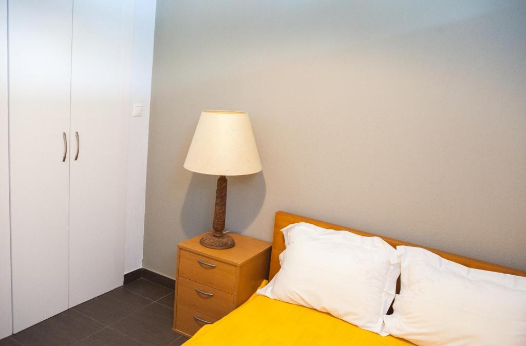 Postel nebo postele na pokoji v ubytování Sea view appartment in Geoponika