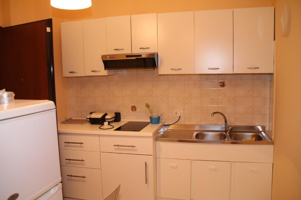 Kuchyň nebo kuchyňský kout v ubytování B&B Bonlet