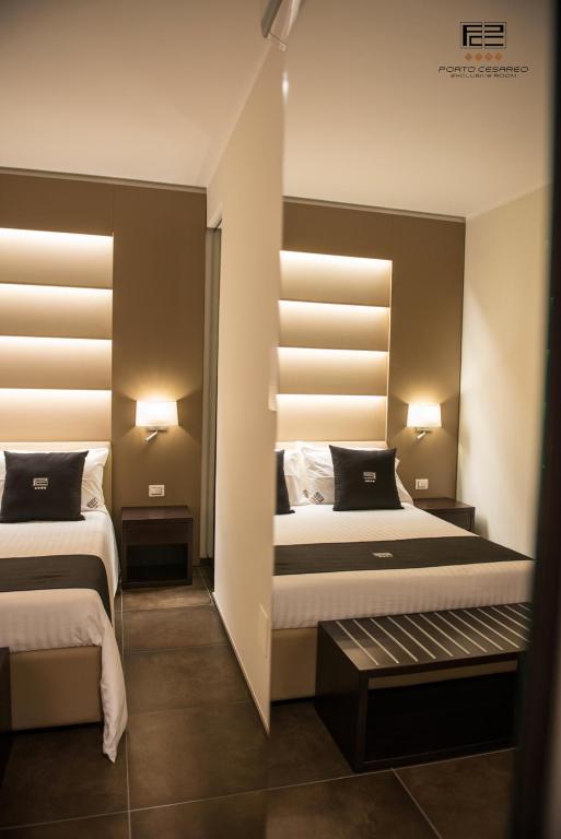 Postel nebo postele na pokoji v ubytování Porto Cesareo Exclusive Room