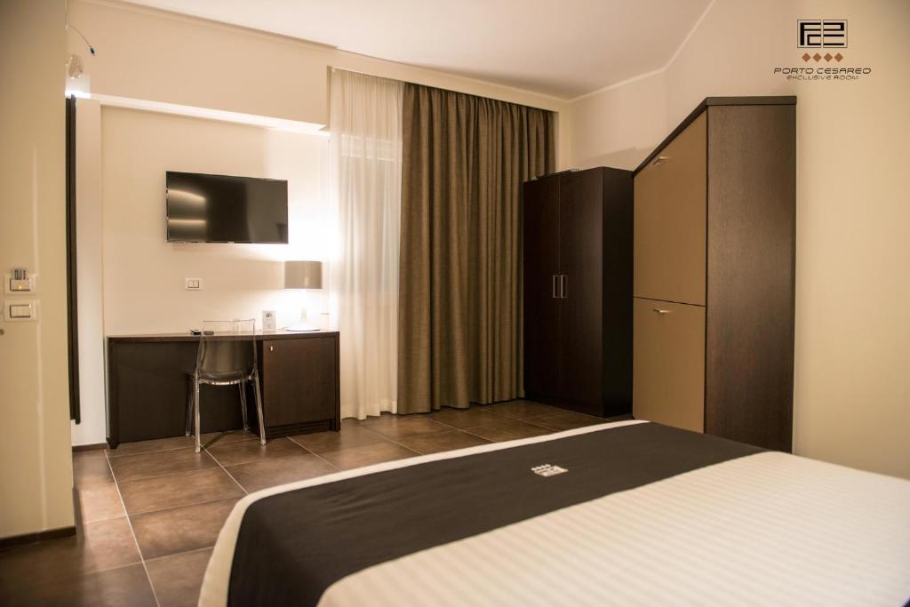 Postel nebo postele na pokoji v ubytování Porto Cesareo Exclusive Room