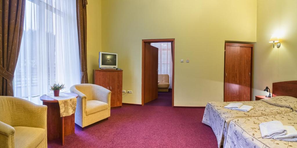 Posteľ alebo postele v izbe v ubytovaní Nowy Dom Zdrojowy