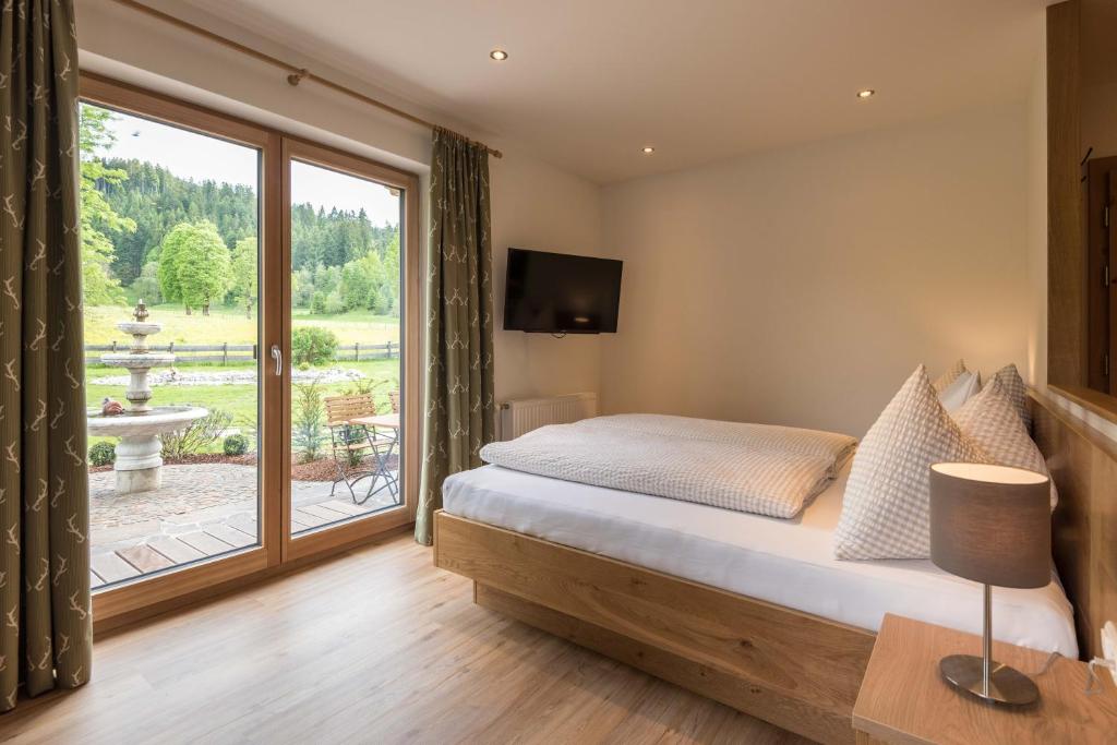Postel nebo postele na pokoji v ubytování Apartments Foidl