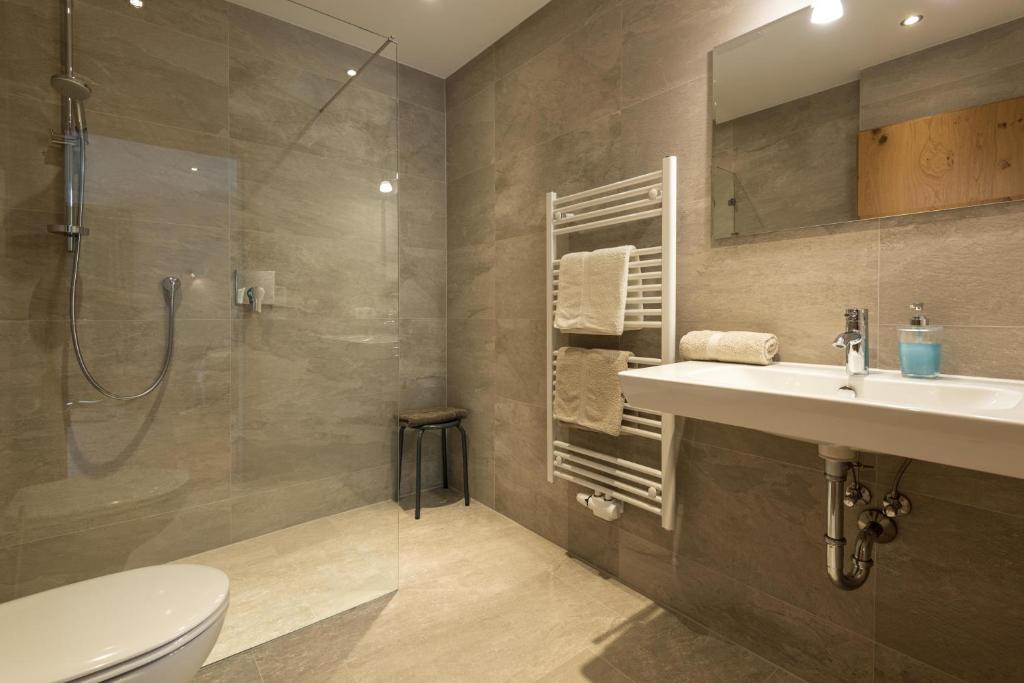 Koupelna v ubytování Apartments Foidl
