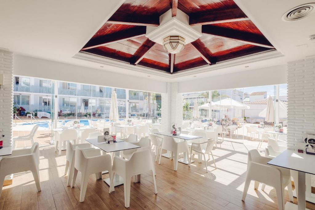 מסעדה או מקום אחר לאכול בו ב-Hotel Villa Flamenca