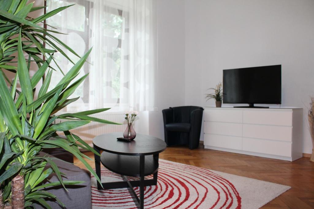 TV a/nebo společenská místnost v ubytování Murtal Apartments