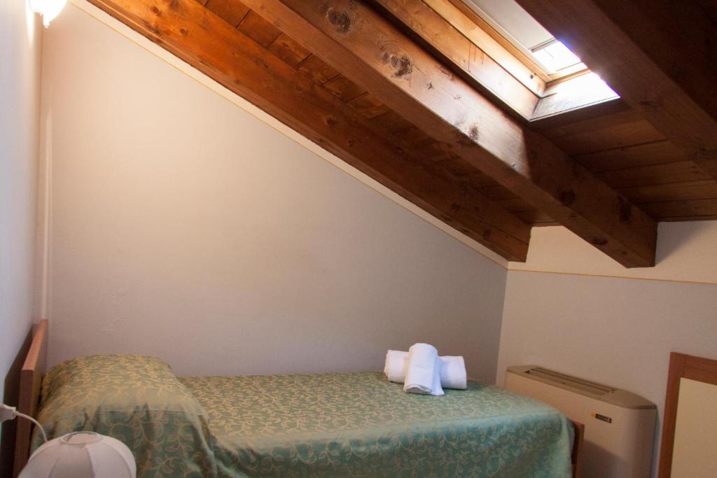 A bed or beds in a room at Lauri & Faggi