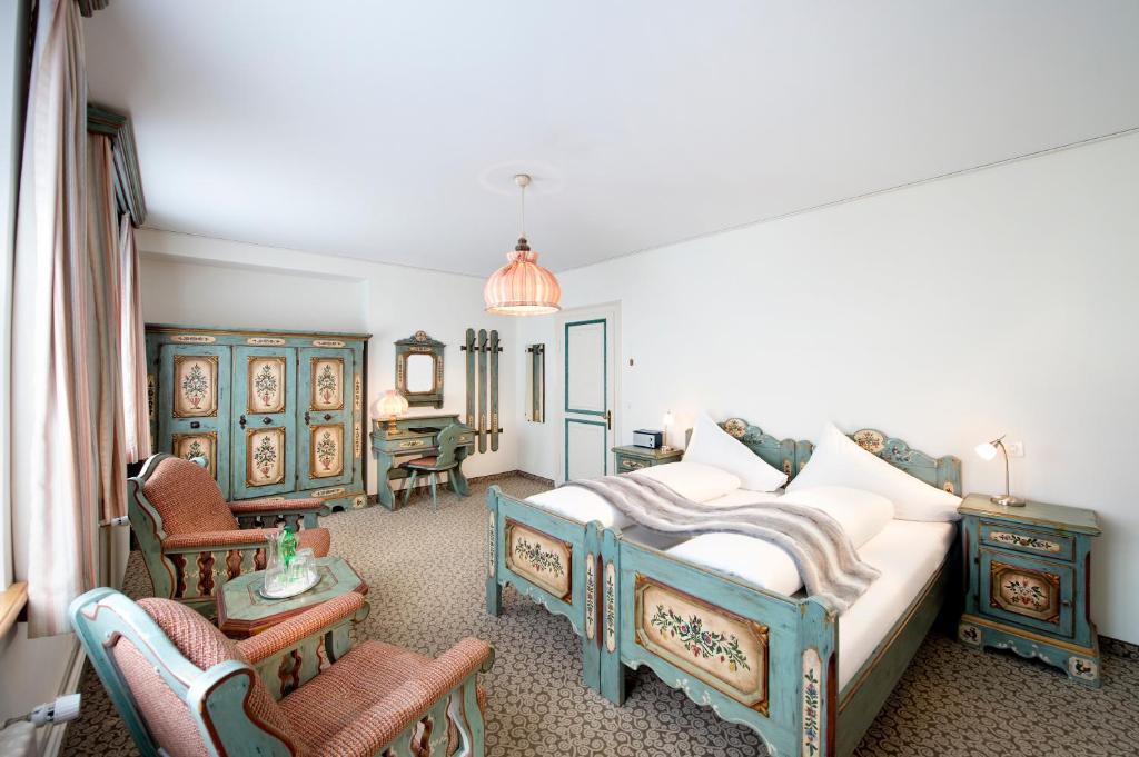 Postel nebo postele na pokoji v ubytování Hotel Schloss Ragaz
