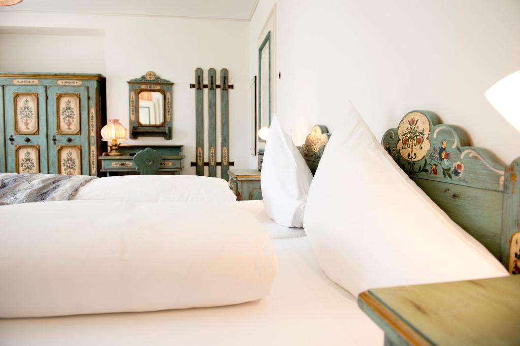Postel nebo postele na pokoji v ubytování Hotel Schloss Ragaz
