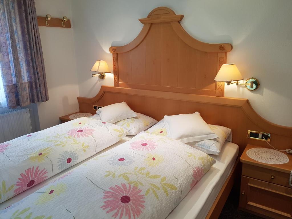 Postel nebo postele na pokoji v ubytování Garni Rubens B&B