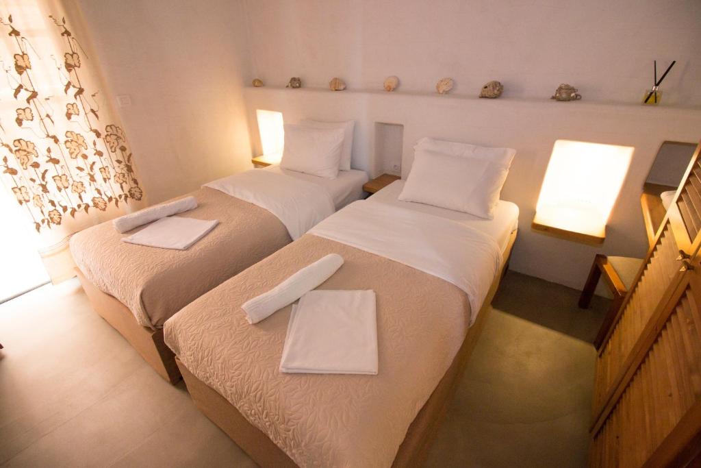 Postel nebo postele na pokoji v ubytování Ilias Apartments