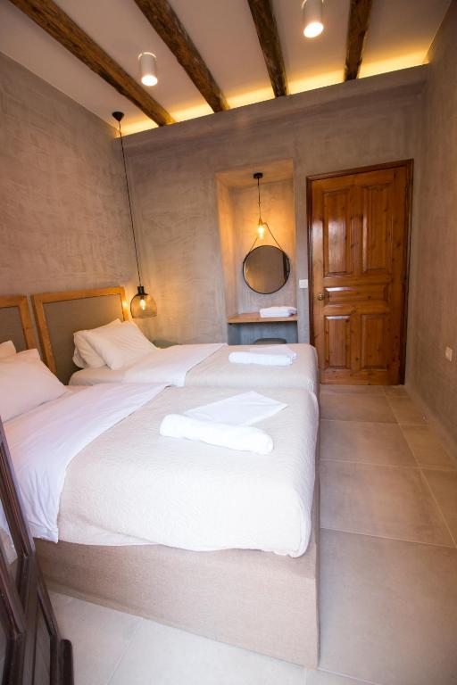 Postel nebo postele na pokoji v ubytování Ilias Apartments