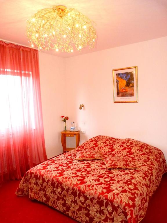 Postel nebo postele na pokoji v ubytování Hotel Krone