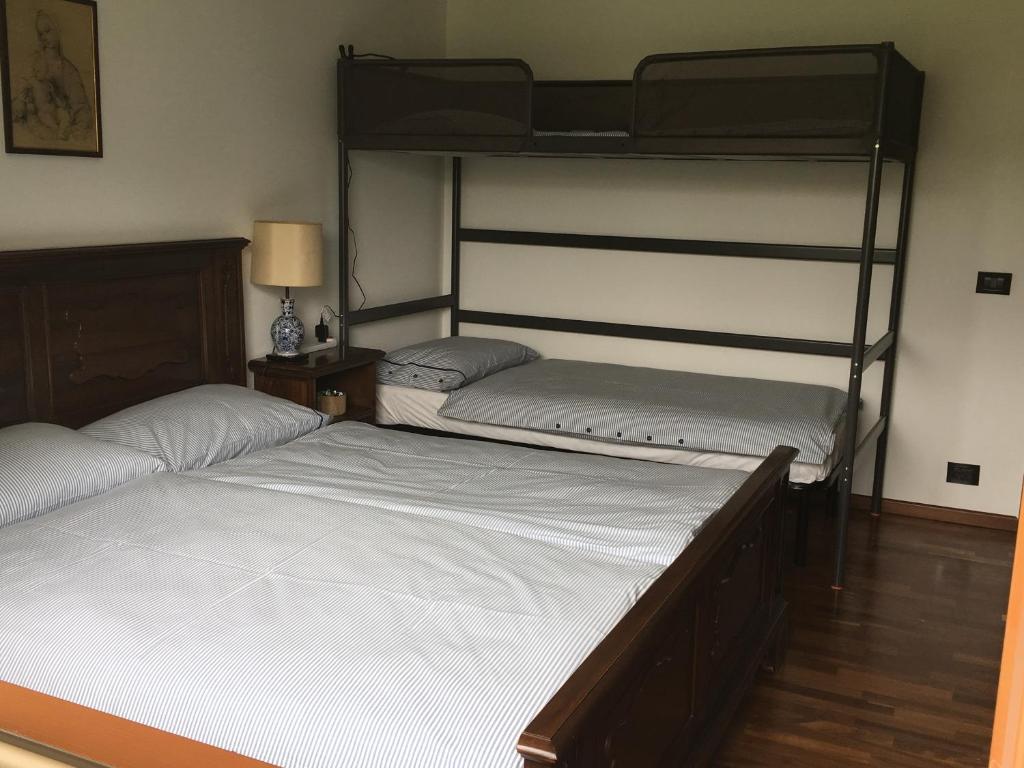 Postel nebo postele na pokoji v ubytování A Cjase di Sandra