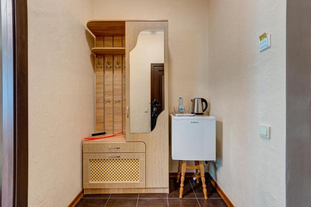 Kuchyň nebo kuchyňský kout v ubytování Aleksandria Hotel