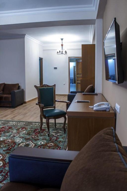 TV a/nebo společenská místnost v ubytování Hotel Plaza Viktoria