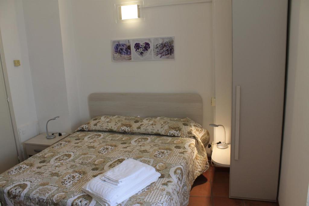 Posteľ alebo postele v izbe v ubytovaní Vacanze In Torre