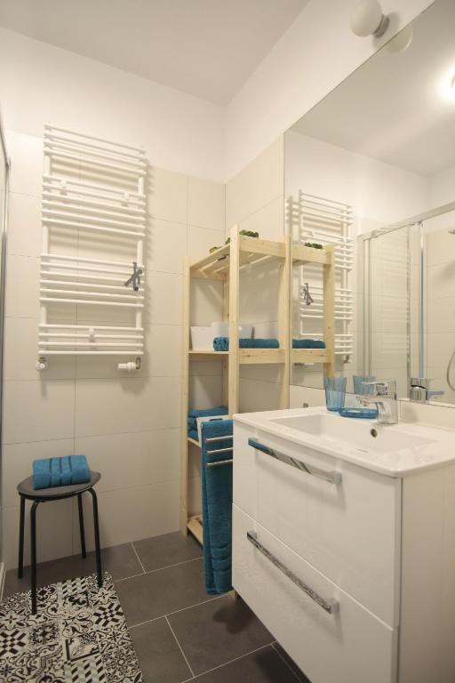 Kúpeľňa v ubytovaní AL-DOM apartamenty Kniewskiego 11 Kolobrzeg