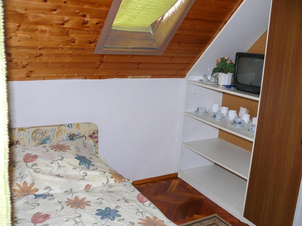 Posteľ alebo postele v izbe v ubytovaní Familia Nyaraló 87