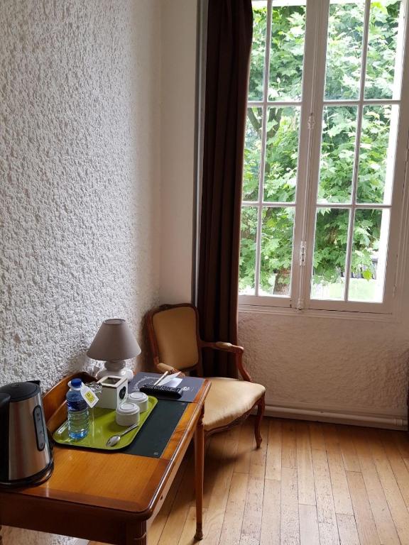 Posezení v ubytování Hotel Restaurant Pavillon Bleu
