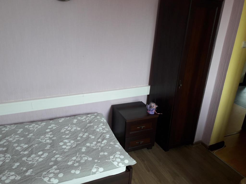 Posteľ alebo postele v izbe v ubytovaní Hostel Pałacyk