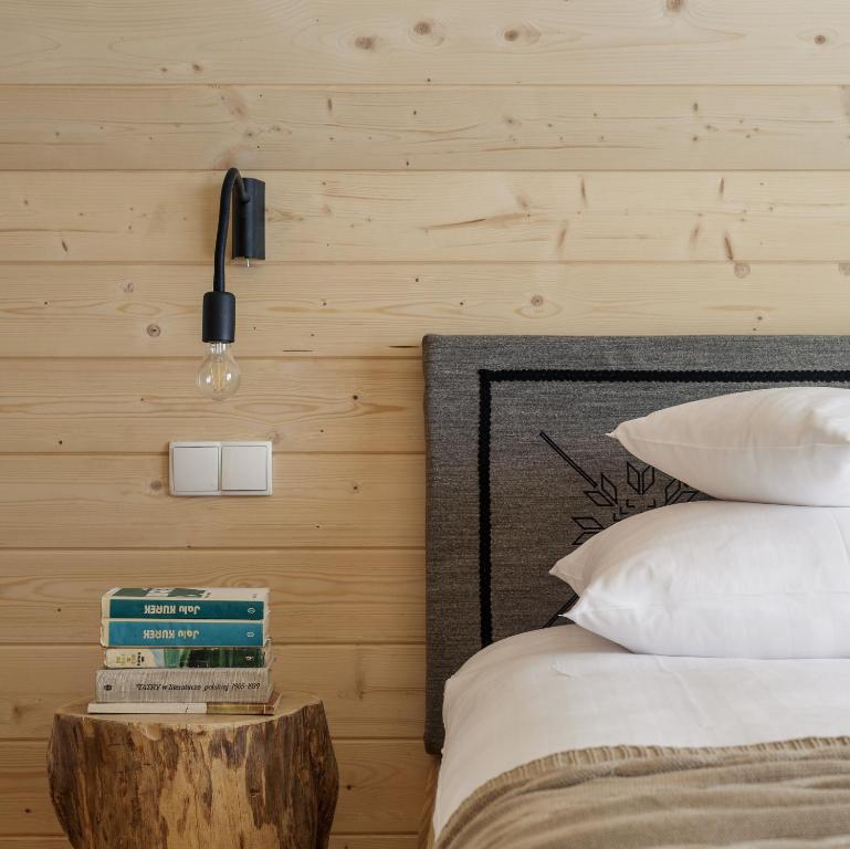 Posteľ alebo postele v izbe v ubytovaní Tatra Wood House