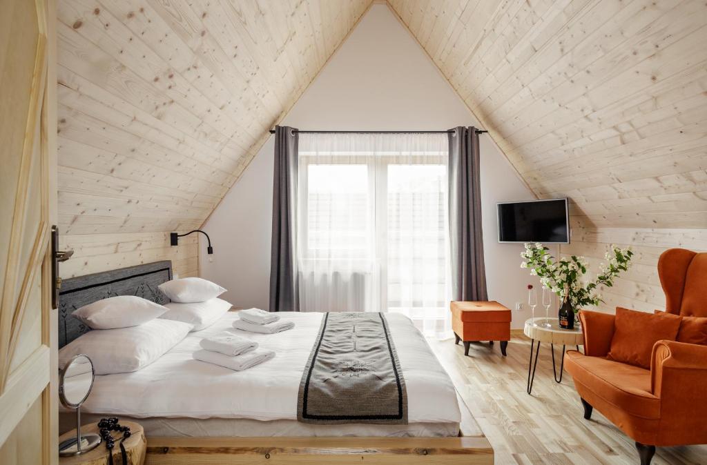 Posteľ alebo postele v izbe v ubytovaní Tatra Wood House