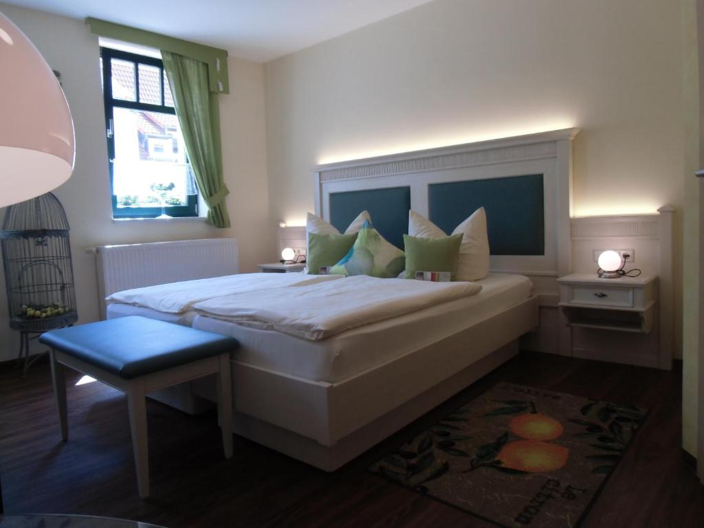 Postel nebo postele na pokoji v ubytování Hotel Trendtino