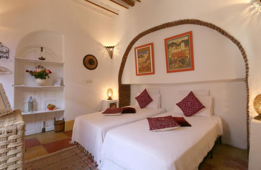 Postel nebo postele na pokoji v ubytování Riad Merstane Marrakech