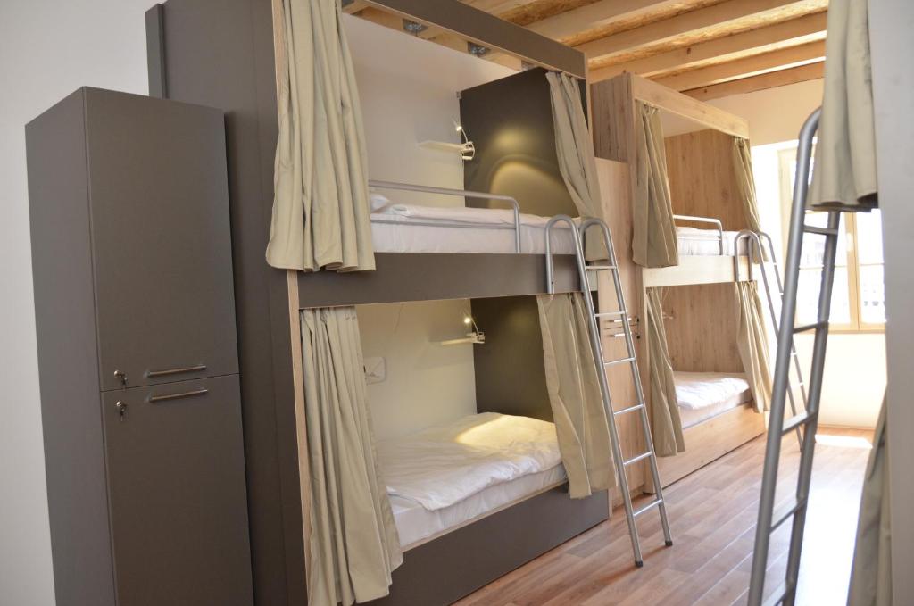 Postel nebo postele na pokoji v ubytování Hostel Antique