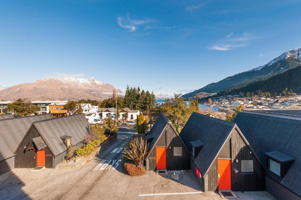 an aerial view of a village with houses at Heartland Hotel Queenstown in Queenstown