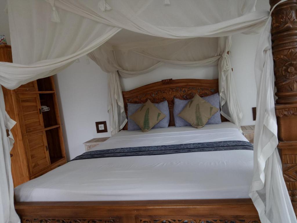 Postel nebo postele na pokoji v ubytování Maple House