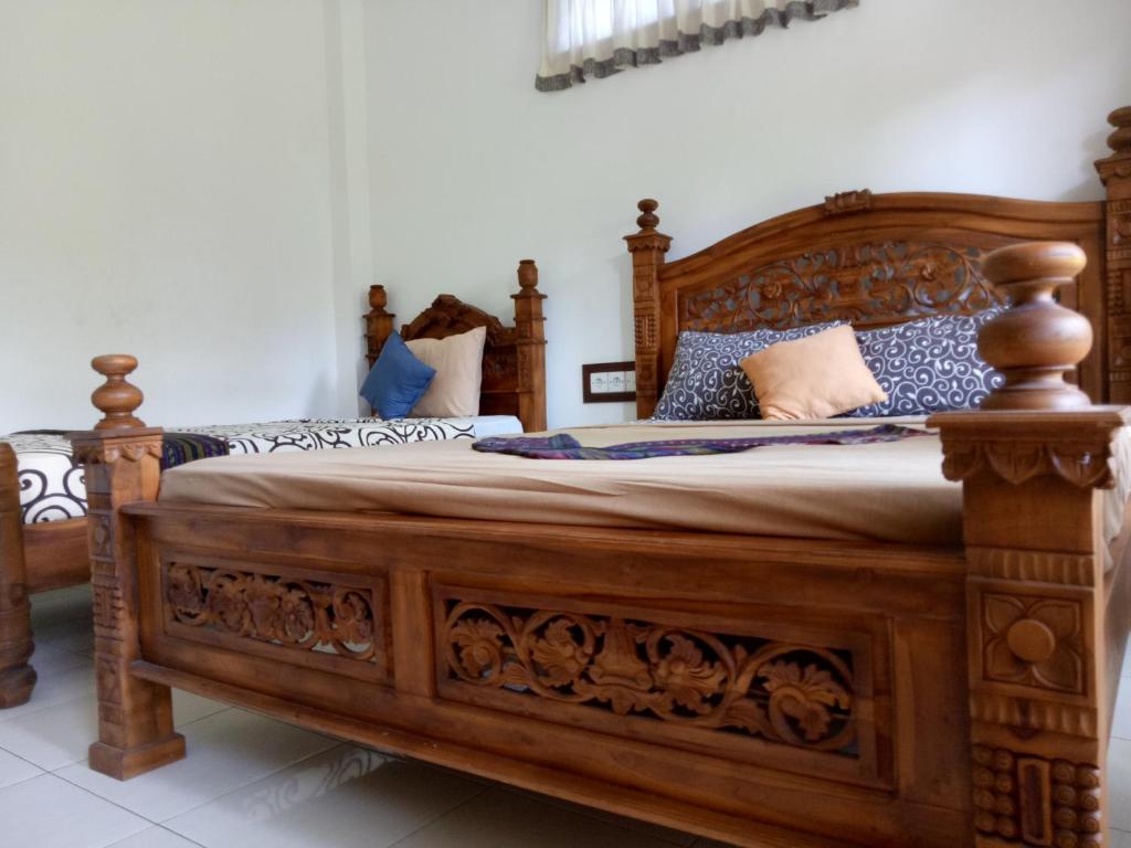 Postel nebo postele na pokoji v ubytování Maple House