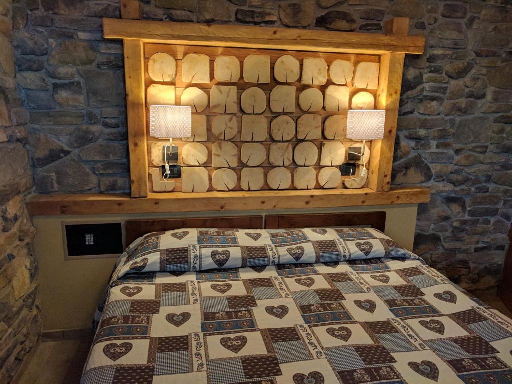 Postel nebo postele na pokoji v ubytování Hotel Piccolo Parco