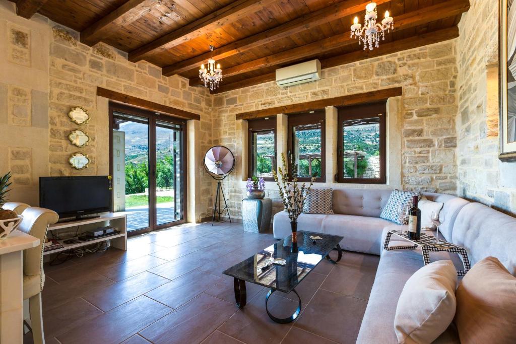Posezení v ubytování Poseidon Villa, nestled in the picturesque south, By ThinkVilla
