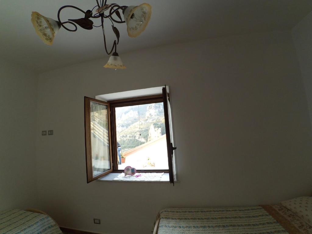 A bed or beds in a room at Il Belvedere