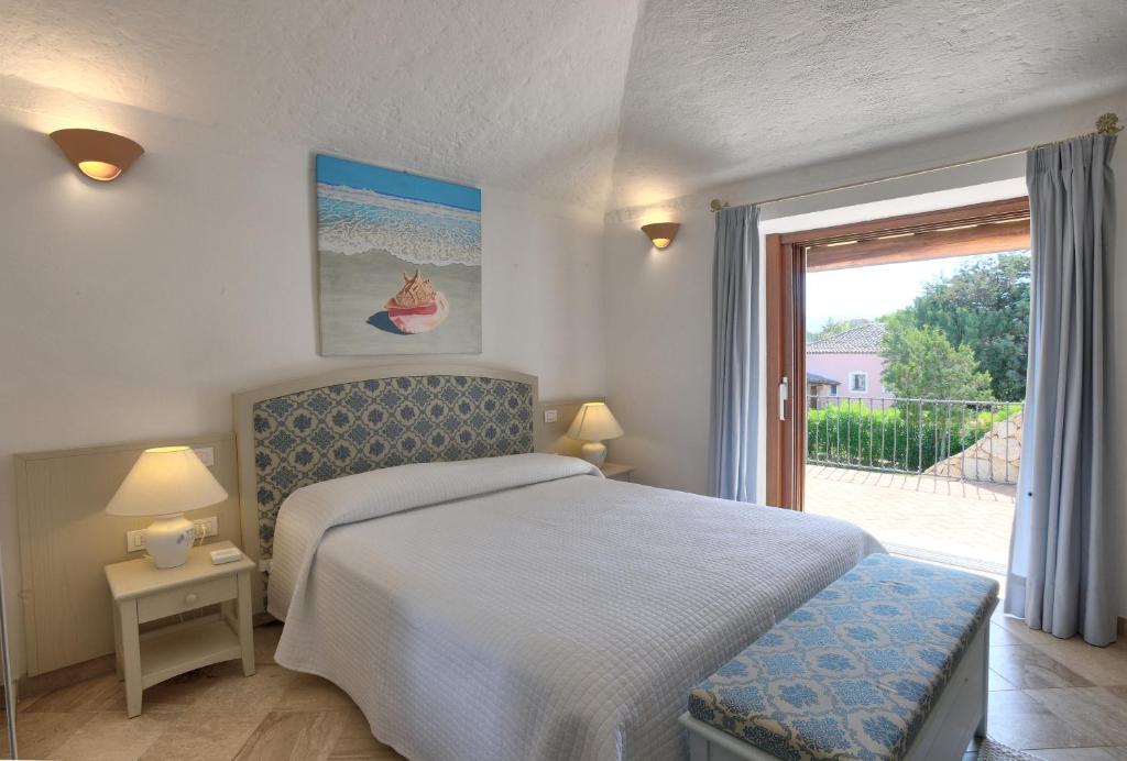 Postel nebo postele na pokoji v ubytování Hotel Nibaru