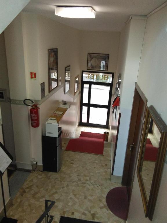 Ліжко або ліжка в номері Hotel Parini
