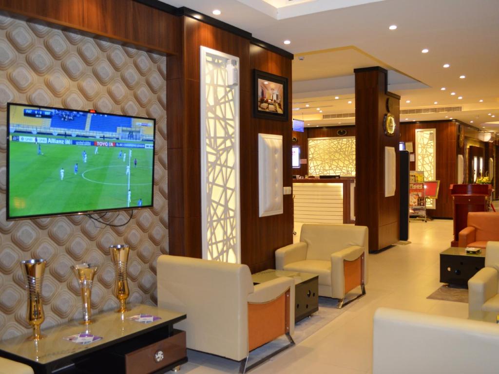 TV a/nebo společenská místnost v ubytování Al Rest Inn Hotel