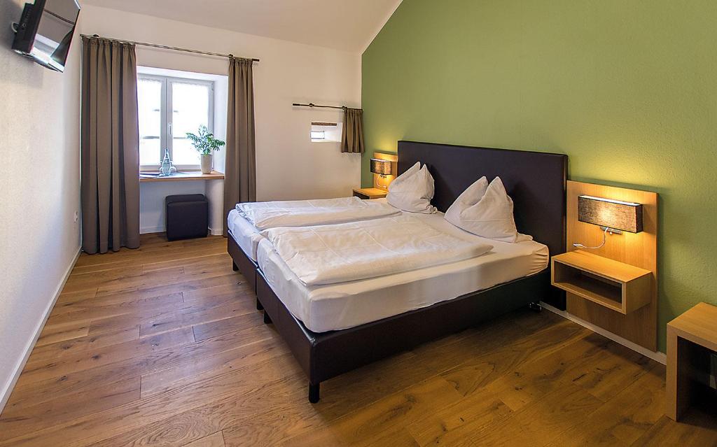 Postel nebo postele na pokoji v ubytování Müllisch's Hof Hotel