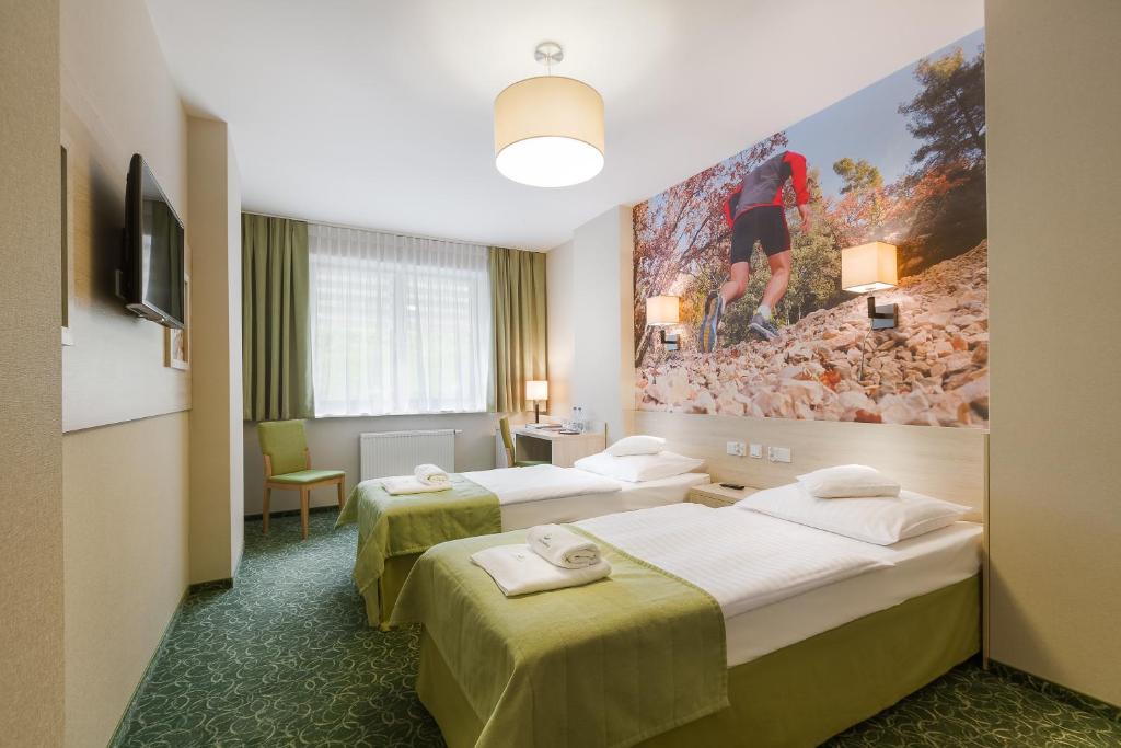 Posteľ alebo postele v izbe v ubytovaní Interferie Sport Hotel Bornit