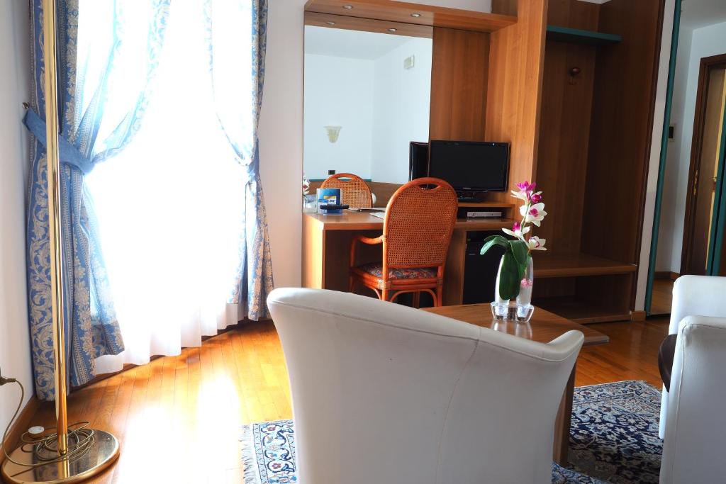 TV a/nebo společenská místnost v ubytování Hotel Spresiano