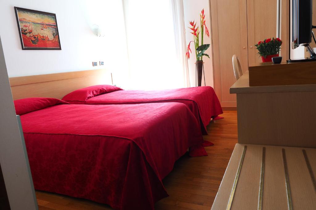 Postel nebo postele na pokoji v ubytování Hotel Spresiano