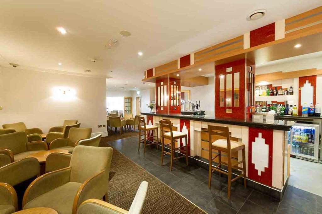 Kuchyň nebo kuchyňský kout v ubytování The Rutland Hotel