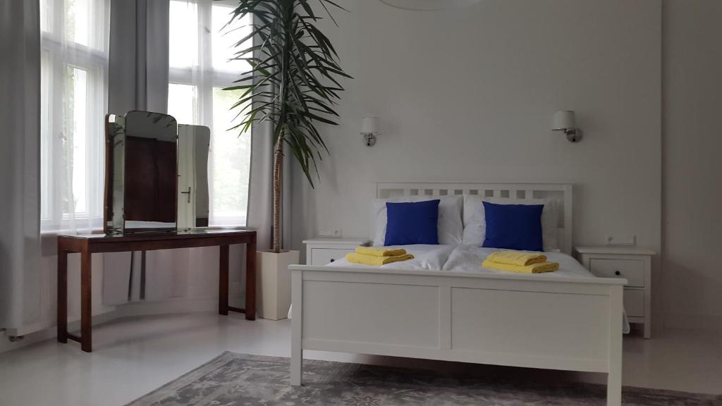 Letto o letti in una camera di Sopot Parkowa Apartment przy plaży