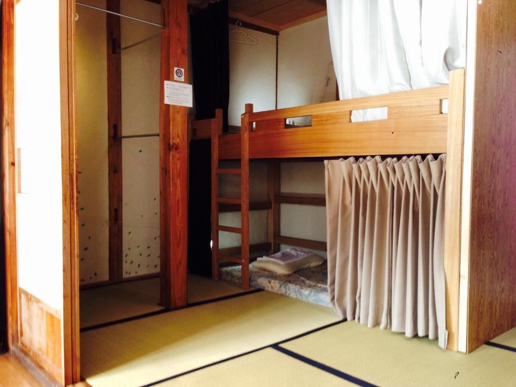 Narivoodi või narivoodid majutusasutuse Guest House YAMASHITA-YA toas