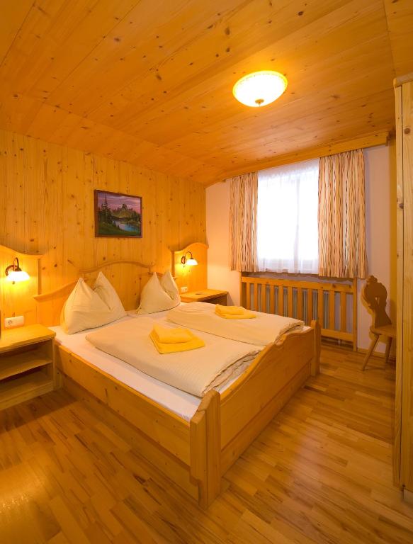 Postel nebo postele na pokoji v ubytování Panorama Pension