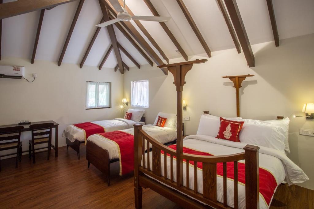 Postel nebo postele na pokoji v ubytování Lar Amorosa Boutique Hotel - Goa