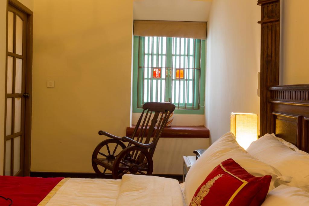 Postel nebo postele na pokoji v ubytování Lar Amorosa Boutique Hotel - Goa