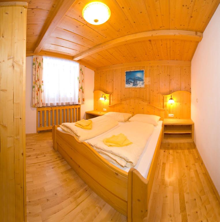 Postel nebo postele na pokoji v ubytování Panorama Pension